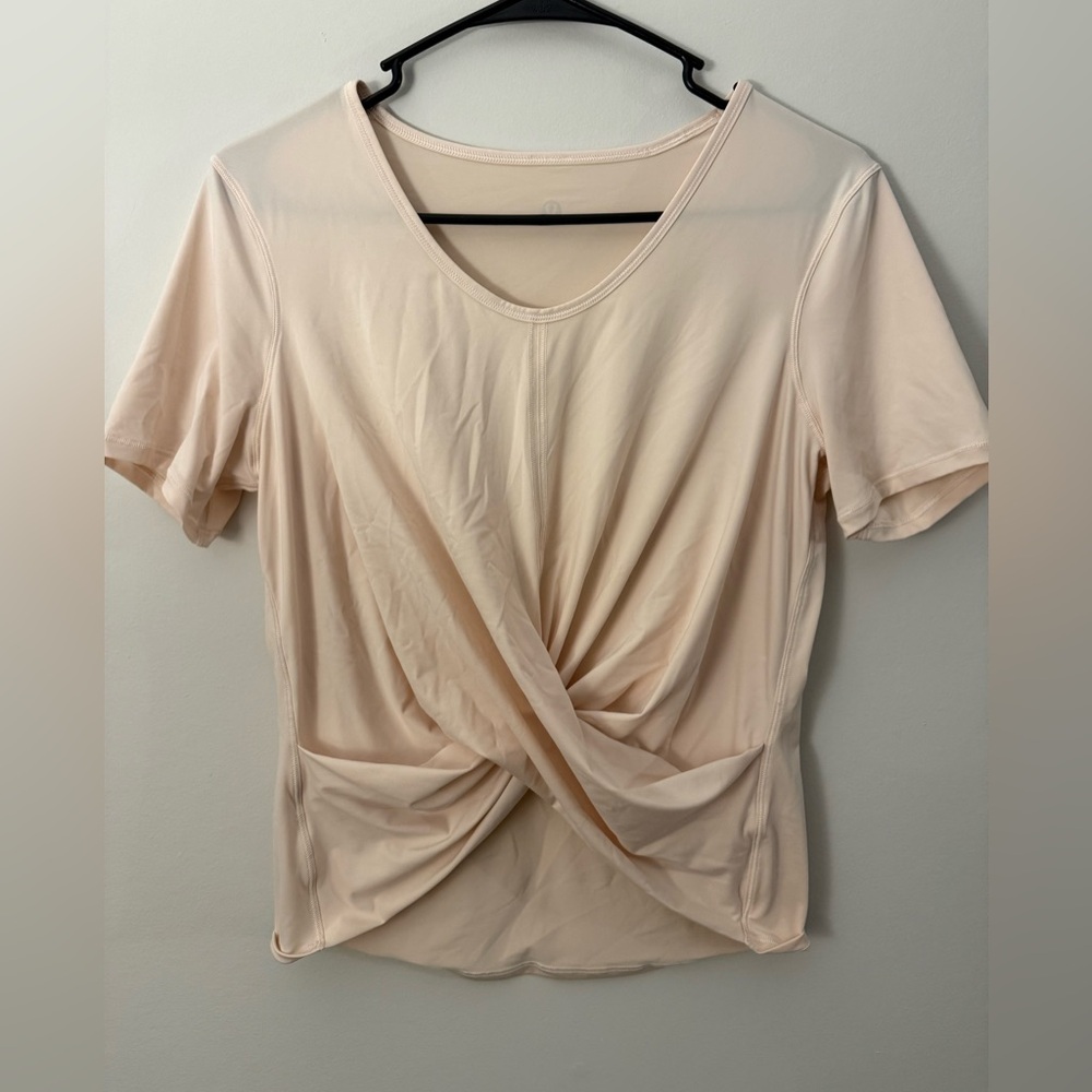 EUC Lululemon Peach Knot Front Short Sleeve PTP Measurement is 20”
